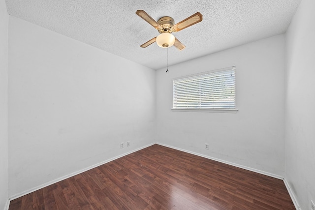 spare room with a textured ceiling, ceiling fan, and hardwood / wood-style flooring