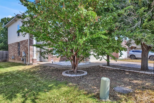 view of yard featuring a garage