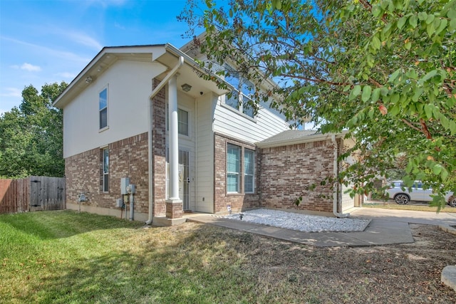 exterior space with a front lawn