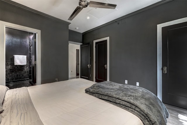 bedroom with crown molding, ceiling fan, and hardwood / wood-style floors