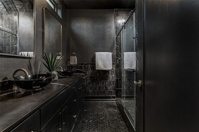 bathroom with vanity and walk in shower