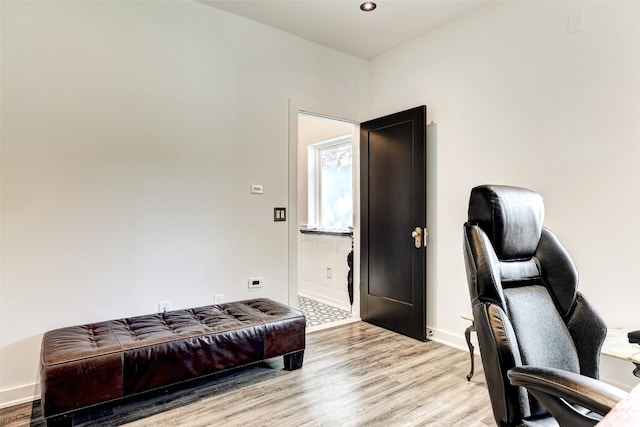 home office with light wood-type flooring