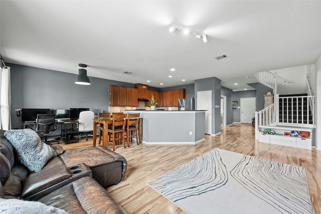 living room featuring light hardwood / wood-style floors