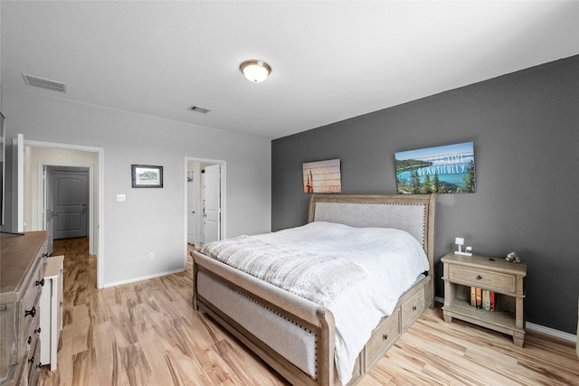 bedroom featuring light wood-type flooring