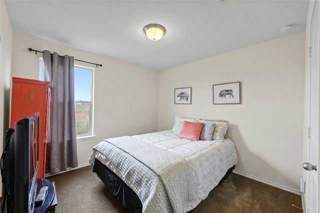 carpeted bedroom featuring multiple windows