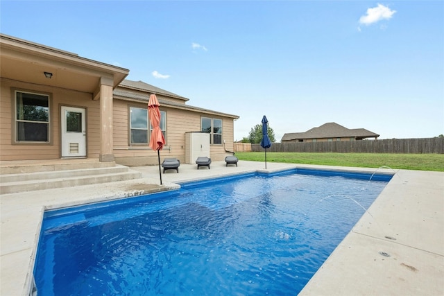 view of pool featuring a patio