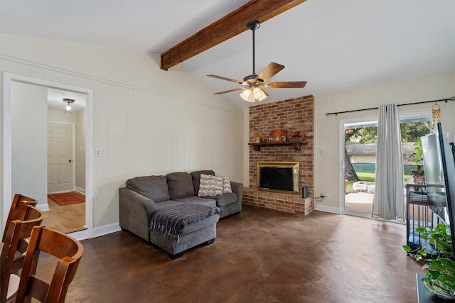 living room with vaulted ceiling with beams, a fireplace, and ceiling fan