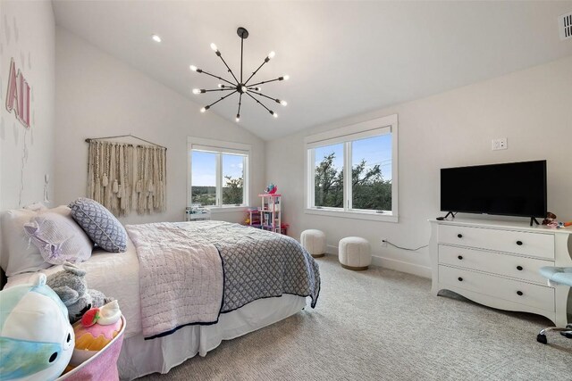 carpeted bedroom with a chandelier and vaulted ceiling