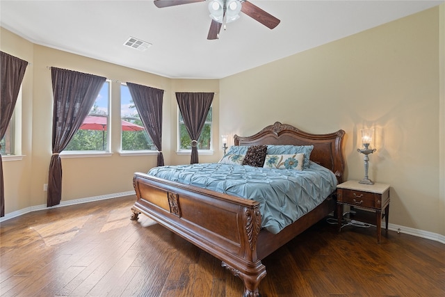 bedroom featuring hardwood / wood-style flooring and ceiling fan