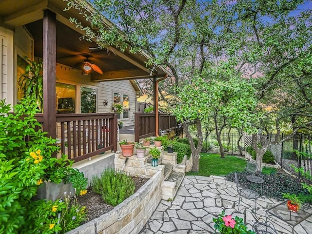 717 Fallow, Horseshoe Bay, TX 78657 - fenced backyard featuring a ceiling fan and a patio