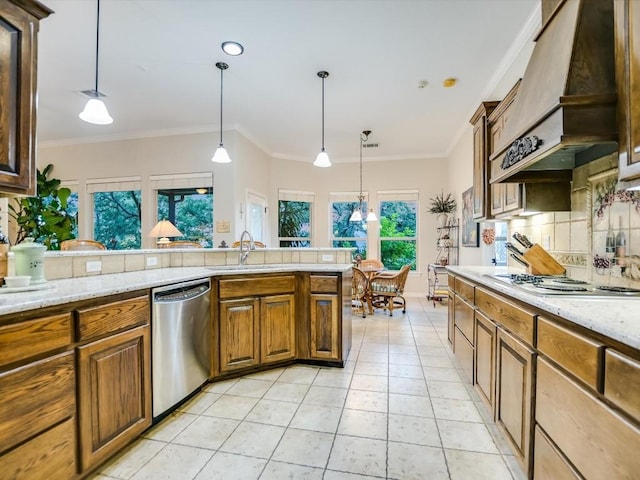 717 Fallow, Horseshoe Bay, TX 78657 - kitchen featuring dishwasher, white stovetop, custom exhaust hood, tasteful backsplash, and brown cabinetry