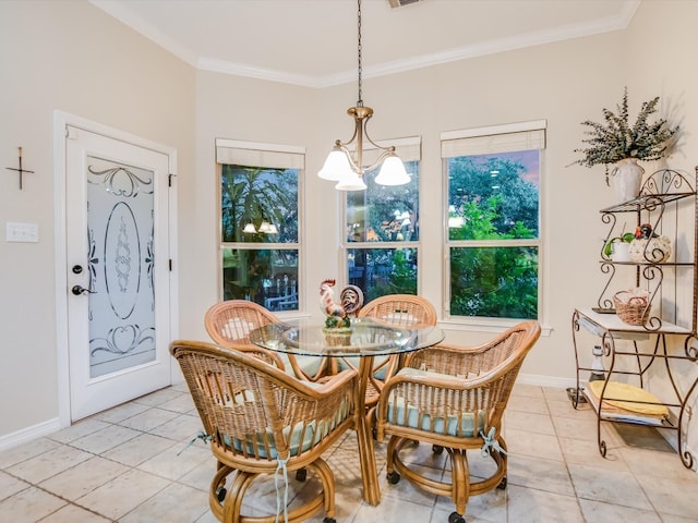 dining area with ornamental molding, light tile patterned floors, and a chandelier