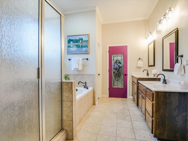 717 Fallow, Horseshoe Bay, TX 78657 - bathroom with double vanity, a stall shower, a garden tub, ornamental molding, and tile patterned flooring