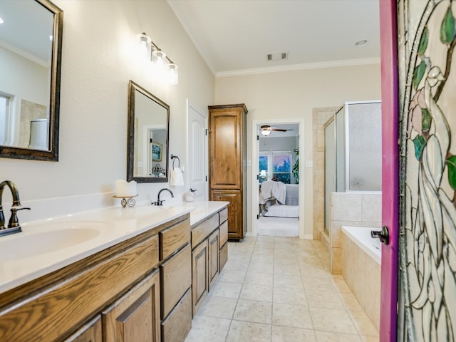 bathroom with tile patterned flooring, crown molding, independent shower and bath, ceiling fan, and vanity