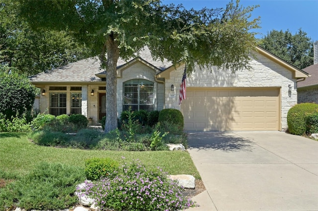 single story home featuring a garage