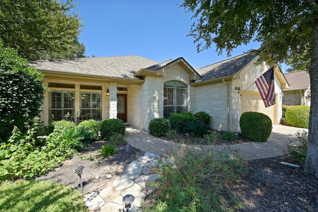 single story home with a garage