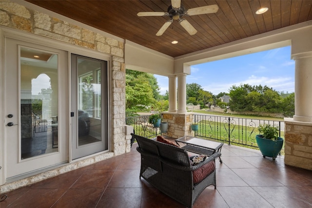 view of patio featuring ceiling fan and covered porch