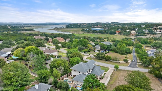 drone / aerial view featuring a water view