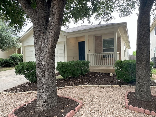 view of front of house featuring a garage and covered porch