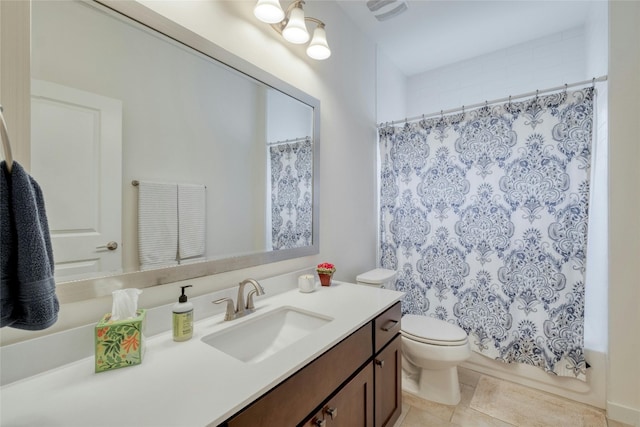 full bathroom with tile patterned flooring, toilet, shower / tub combo with curtain, and vanity