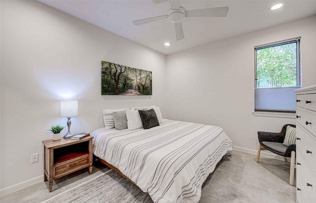 bedroom with recessed lighting, a ceiling fan, baseboards, and light colored carpet