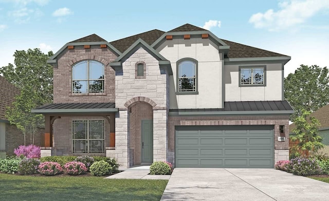 view of front of home with a garage and a front lawn