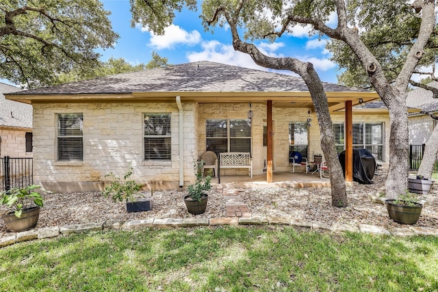 rear view of house featuring a patio area