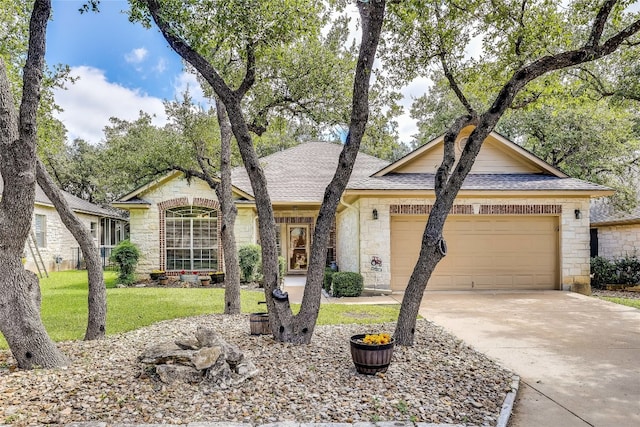 ranch-style house with a garage and a front lawn