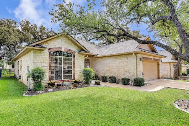 ranch-style home featuring a front yard and a garage