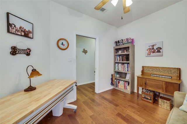 interior space featuring ceiling fan and light hardwood / wood-style flooring