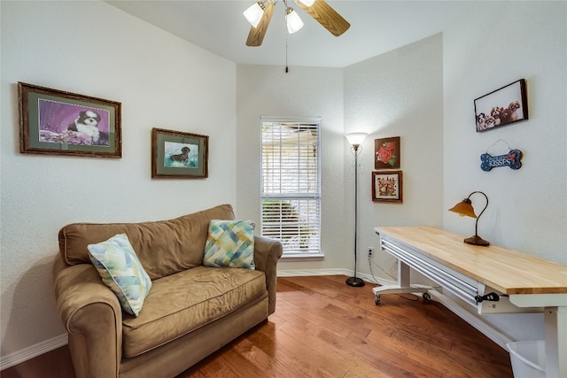 interior space featuring ceiling fan and hardwood / wood-style flooring