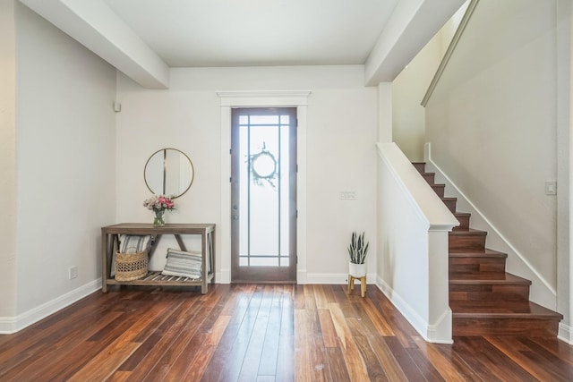 entrance foyer featuring dark wood-type flooring