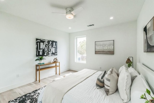 bedroom featuring light wood-type flooring and ceiling fan