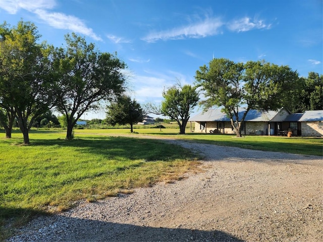 view of road with driveway