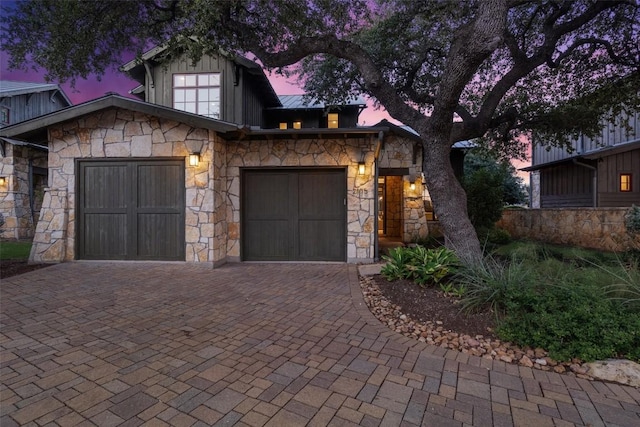 2105 Keeneland Cv Unit 6, Spicewood, TX 78669 - view of front of home with stone siding, decorative driveway, and board and batten siding