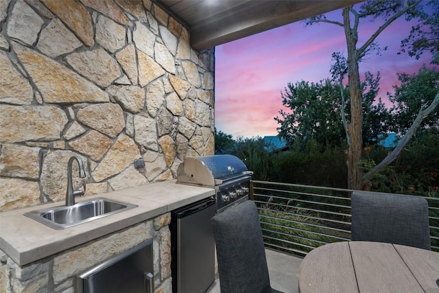 2105 Keeneland Cv Unit 6, Spicewood, TX 78669 - exterior space featuring exterior kitchen, a sink, and area for grilling