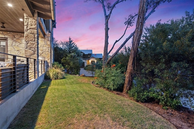 2105 Keeneland Cv Unit 6, Spicewood, TX 78669 - view of yard at dusk