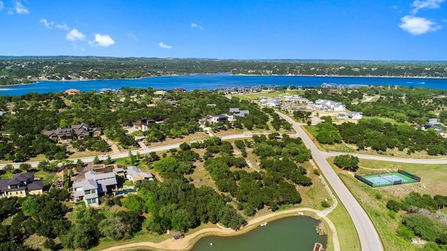 2105 Keeneland Cv Unit 6, Spicewood, TX 78669 - aerial perspective of suburban area with a nearby body of water and a tree filled landscape