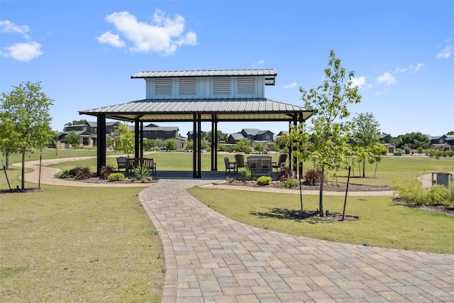 view of home's community featuring a lawn and a gazebo