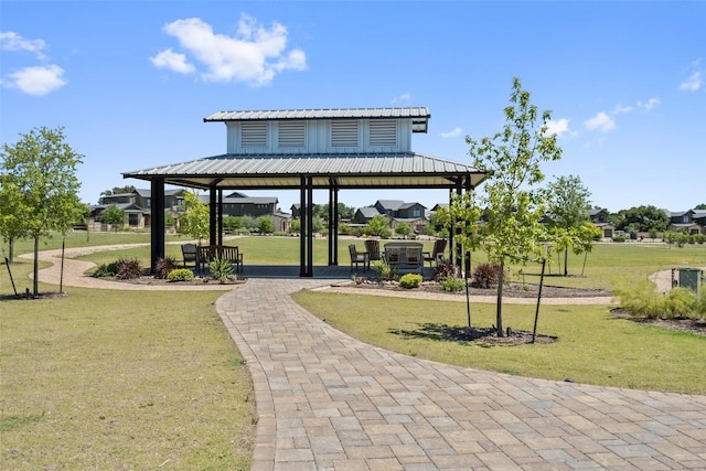 2105 Keeneland Cv Unit 6, Spicewood, TX 78669 - view of property's community featuring a lawn and a gazebo