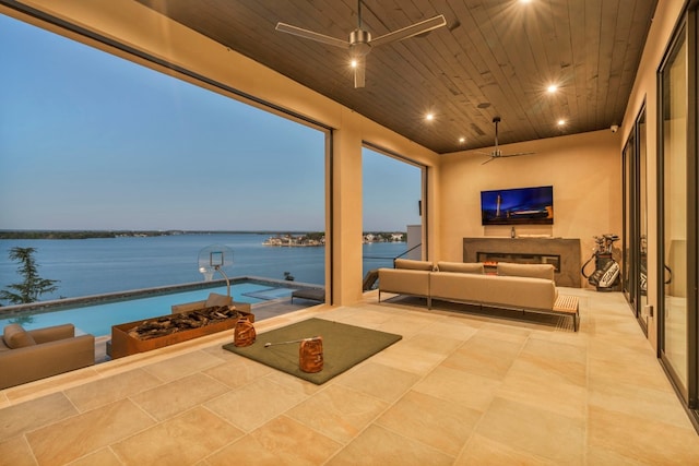 view of patio featuring ceiling fan