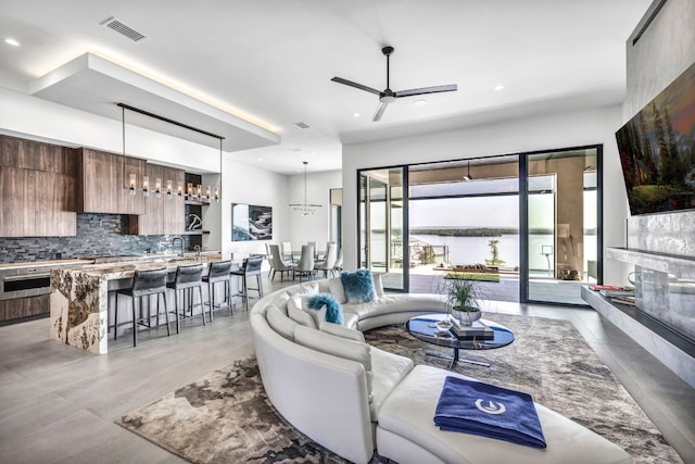 living room with ceiling fan