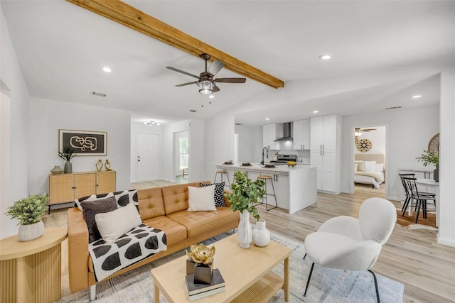 2110 Malvern Hill Dr, Austin, TX 78745 - living room featuring ceiling fan, light wood-style flooring, and recessed lighting