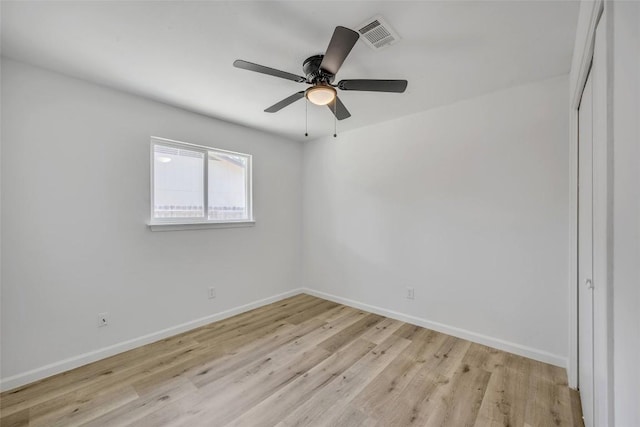 2110 Malvern Hill Dr, Austin, TX 78745 - spare room featuring light wood finished floors, baseboards, and ceiling fan