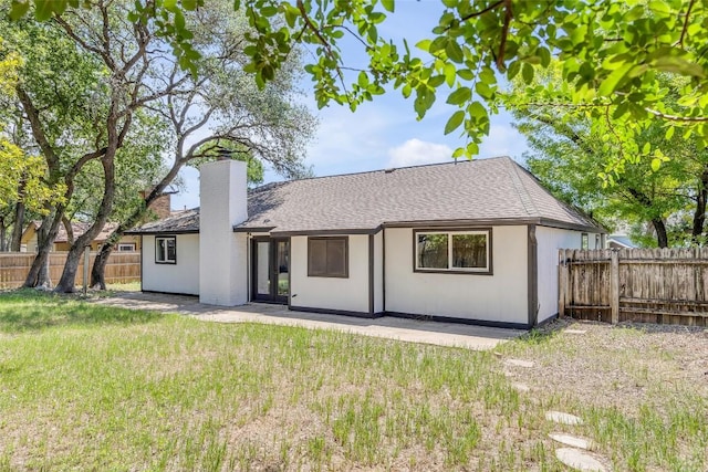 2110 Malvern Hill Dr, Austin, TX 78745 - rear view of property with a chimney, a patio area, a shingled roof, and french doors