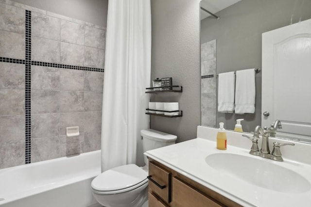2717 Highland Trl, Leander, TX 78641 - bathroom featuring toilet, shower / bath combo, vanity, and a textured wall