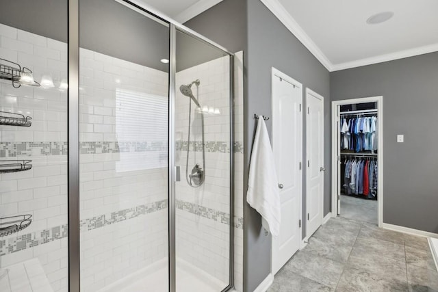 2717 Highland Trl, Leander, TX 78641 - full bathroom featuring crown molding, a shower stall, a walk in closet, and baseboards