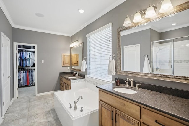 2717 Highland Trl, Leander, TX 78641 - full bath with a stall shower, vanity, a bath, crown molding, and a spacious closet
