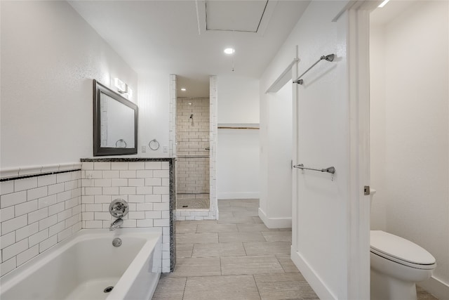 bathroom featuring independent shower and bath, tile patterned flooring, and toilet