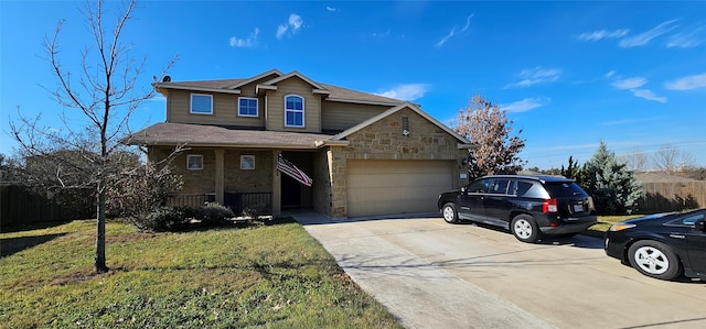 view of front of home with a porch, a front yard, and a garage